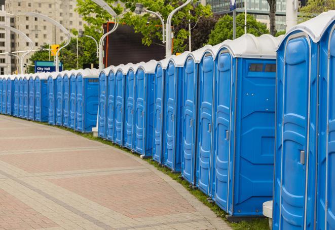 a row of portable restrooms ready for eventgoers in Basehor, KS